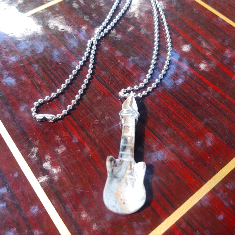 Guitar Palm stone 925 sterling silver wrapped around neck of guitar necklace